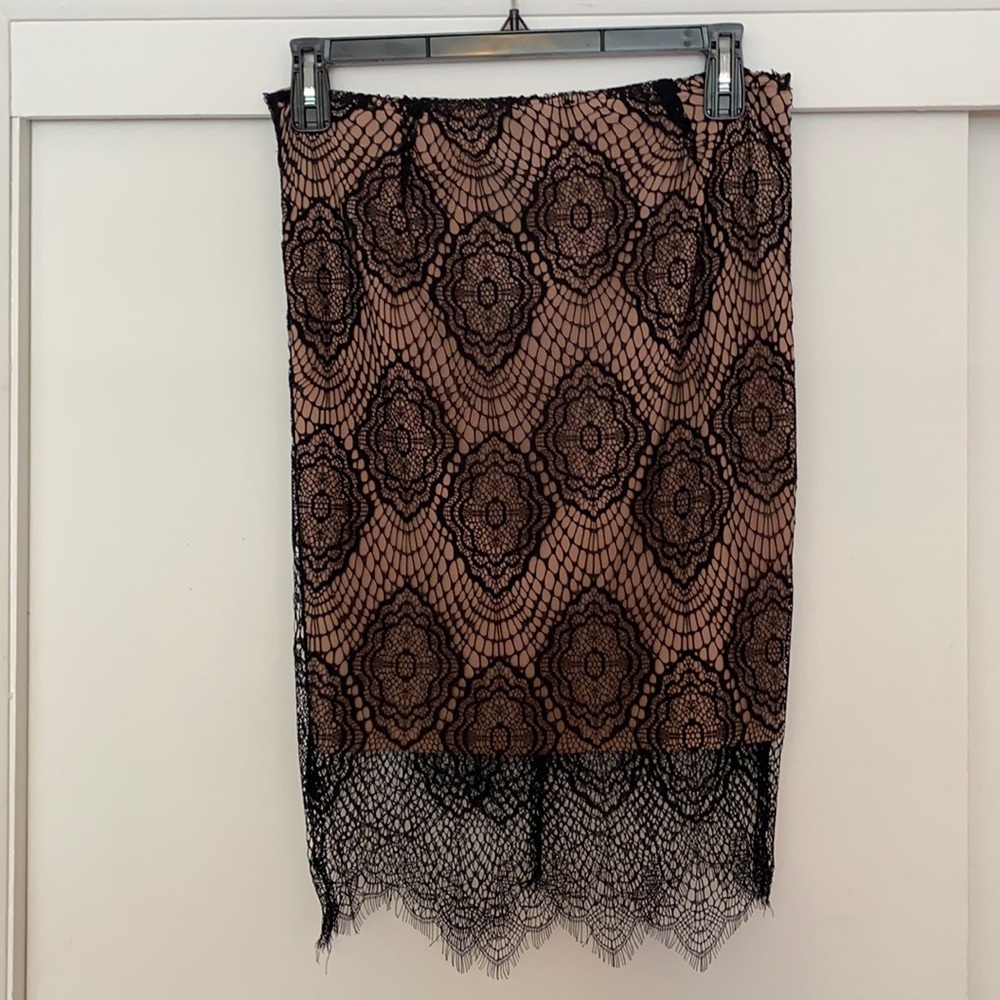 Fully lined lace skirt.